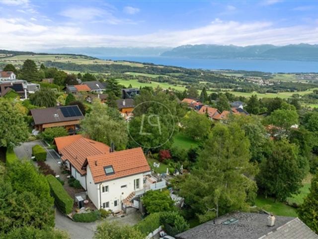 Einfamilienhaus kaufen in Arzier, Waadt