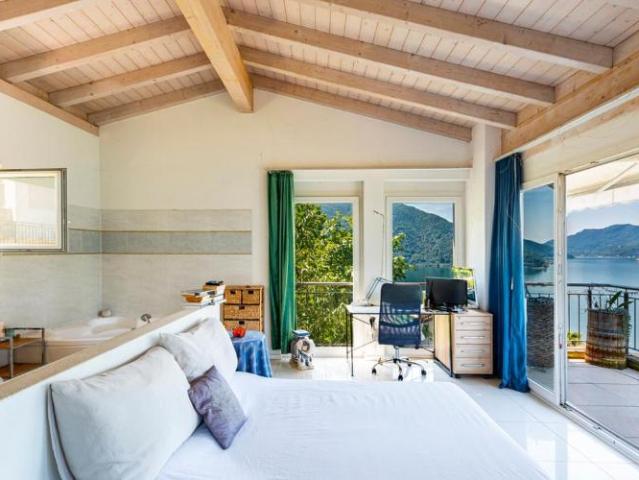 Haus kaufen in Bissone, Tessin
