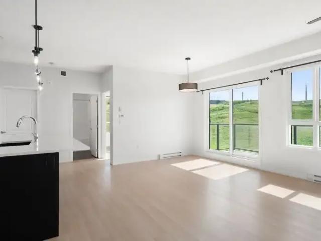 Condo for rent in Riverstone Manor, Calgary