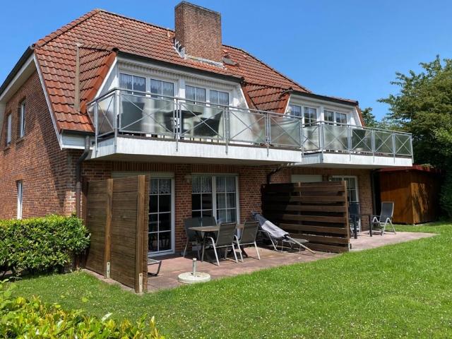 Dachgeschosswohnung kaufen in Hooksiel, Wangerland