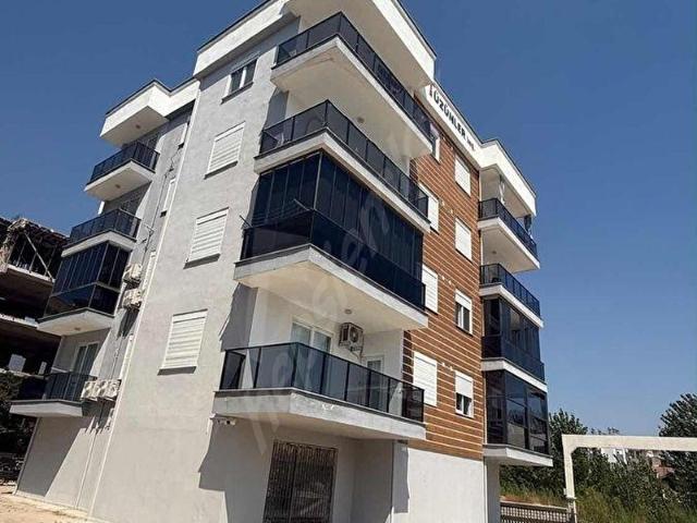 Kum, Finike içerisinde satılık mülk