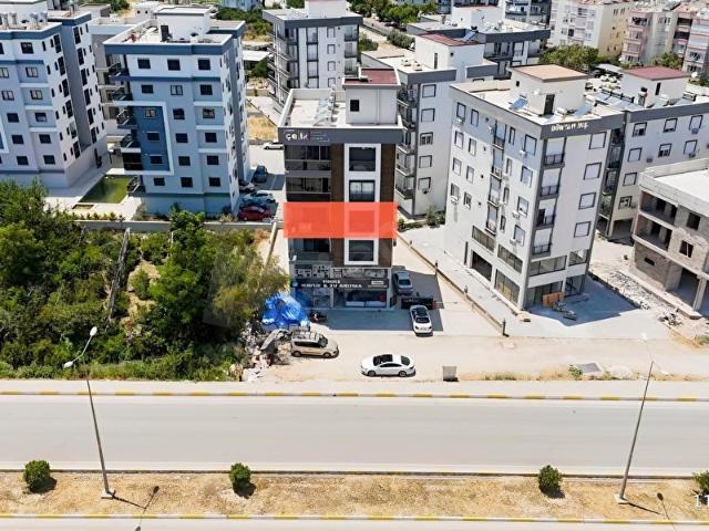 Kum, Finike içerisinde satılık mülk