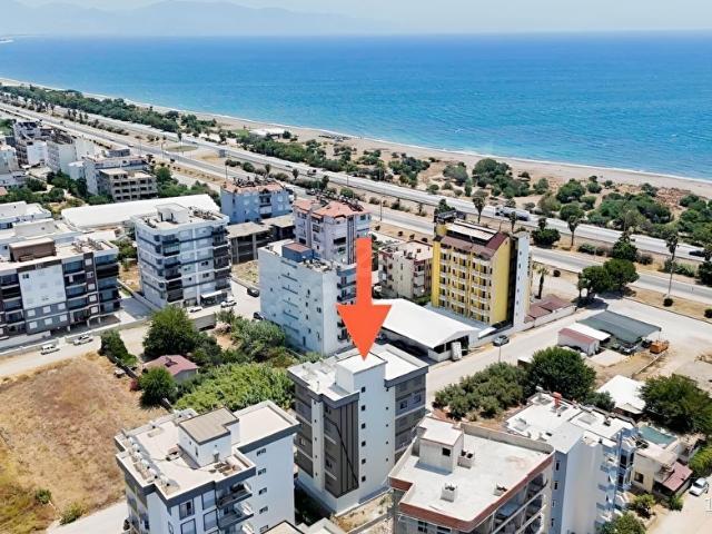 Kum, Finike içerisinde satılık mülk
