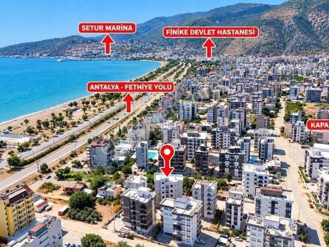 Kum, Finike içerisinde satılık mülk