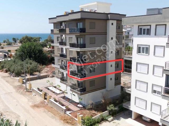 Kum, Finike içerisinde satılık mülk