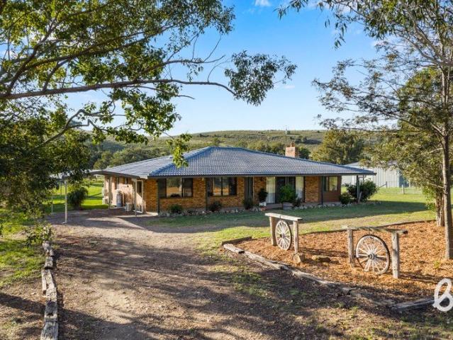 Cottage for sale in Glendon Brook, New South Wales