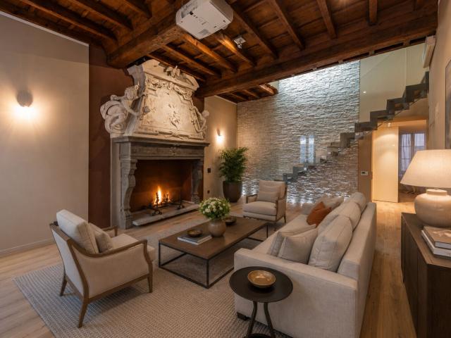Maisonette kaufen in Bissone, Tessin