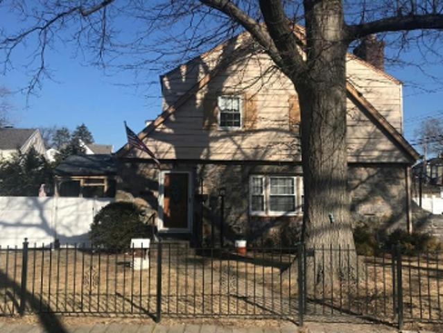House for sale in Glenwood, New York