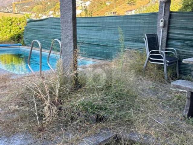 Haus kaufen in Gordola, Tessin