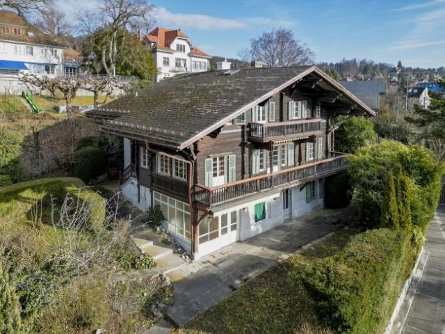 Einfamilienhaus kaufen in Einigen, Zürich