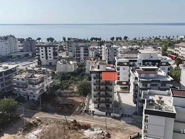 Kum, Finike içerisinde satılık mülk