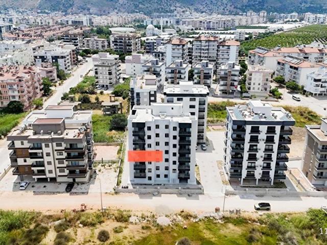 Kum, Finike içerisinde satılık mülk