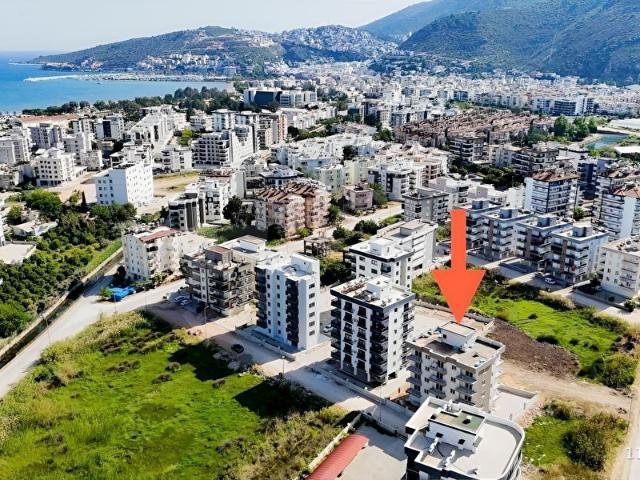 Kum, Finike içerisinde satılık mülk
