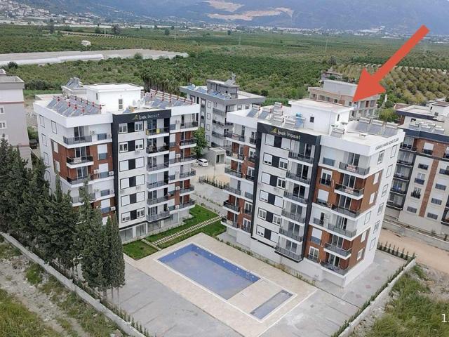 Kum, Finike içerisinde satılık mülk