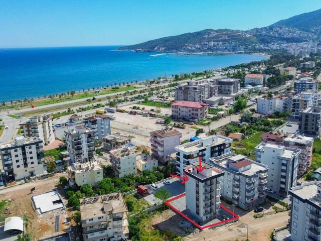 Kum, Finike içerisinde satılık mülk