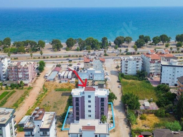 Kum, Finike içerisinde satılık mülk