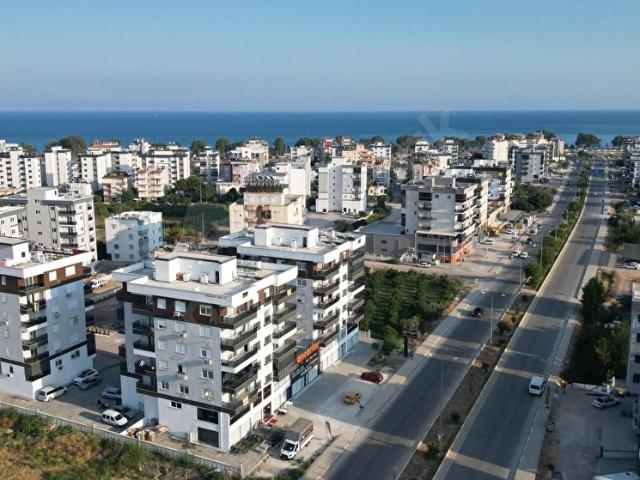 Kum, Finike içerisinde satılık mülk