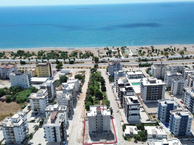 Kum, Finike içerisinde satılık mülk