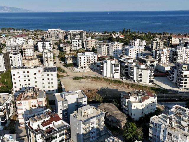 Kum, Finike içerisinde satılık mülk