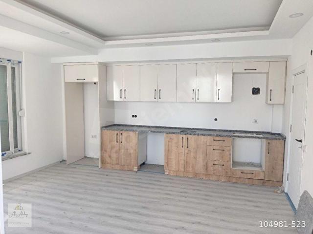Kum, Finike içerisinde satılık mülk