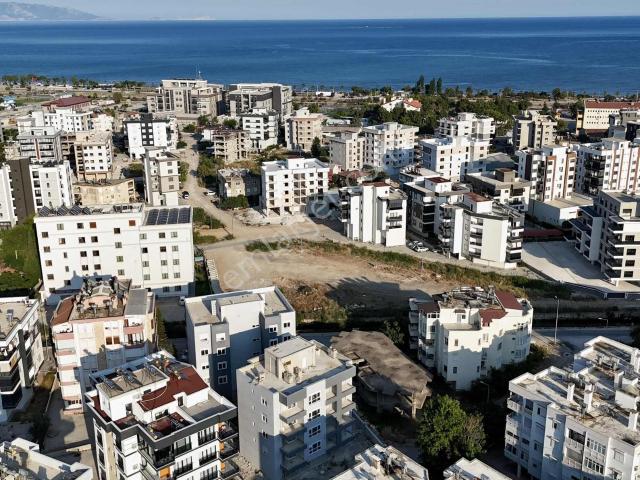 Kum, Finike içerisinde satılık mülk