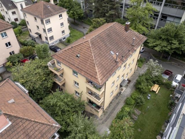 Mehrfamilienhaus kaufen in Einigen, Zürich