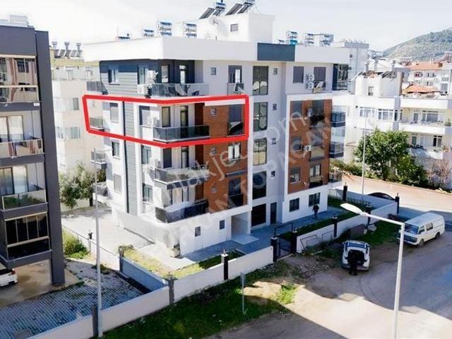 Kum, Finike içerisinde satılık mülk
