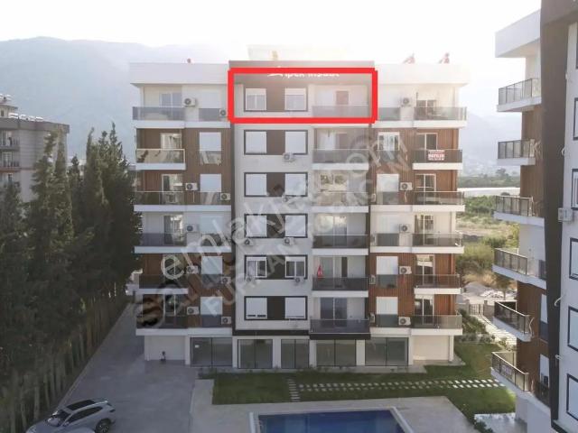 Kum, Finike içerisinde satılık mülk