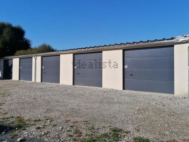 Garage location à Villeneuve, Monnaie