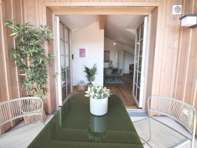 Dachgeschosswohnung kaufen in Ragging, Surheim