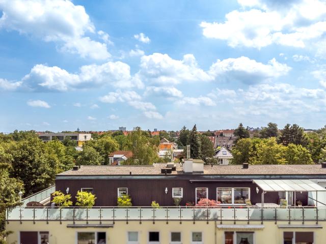 Dachgeschosswohnung kaufen in Laim, München