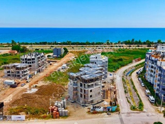 Kum, Finike içerisinde satılık mülk