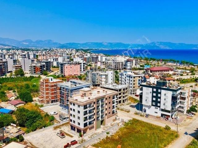 Kum, Finike içerisinde satılık mülk