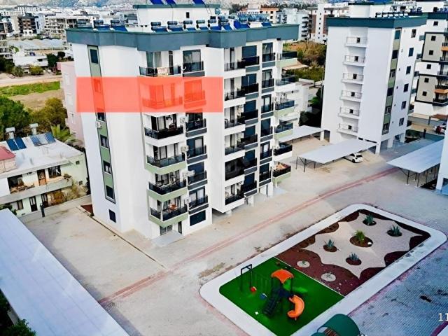 Kum, Finike içerisinde satılık mülk