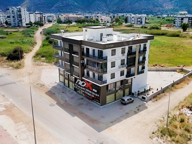 Kum, Finike içerisinde satılık mülk