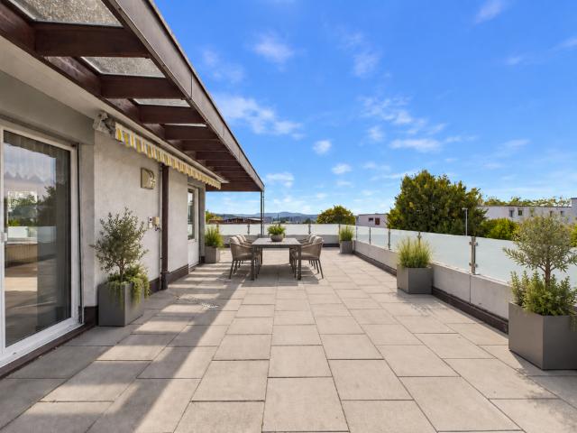 Terrassenwohnung kaufen in Kloten, Bezirk Bülach