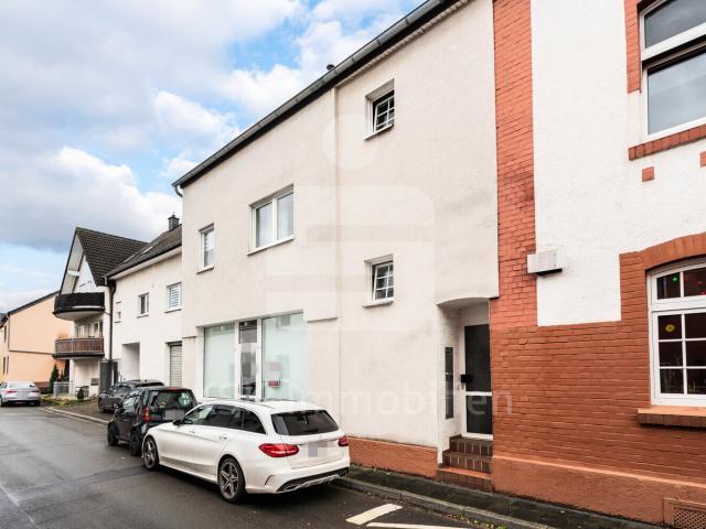 Dachgeschosswohnung kaufen in Spich, Troisdorf