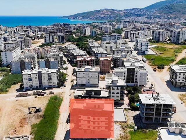 Kum, Finike içerisinde satılık mülk