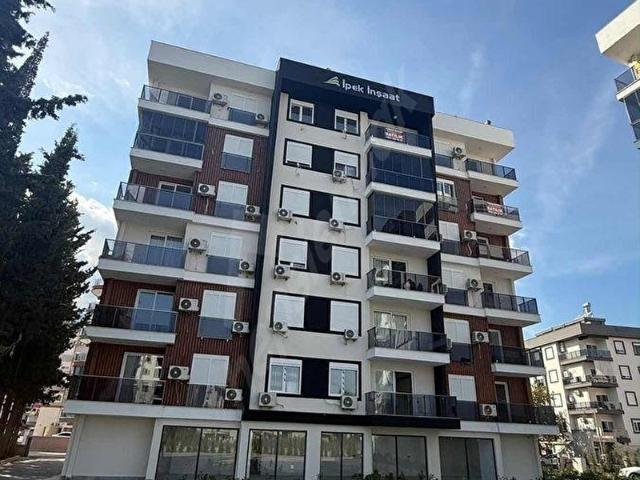Kum, Finike içerisinde satılık mülk