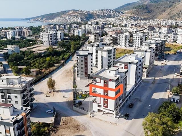 Kum, Finike içerisinde satılık mülk