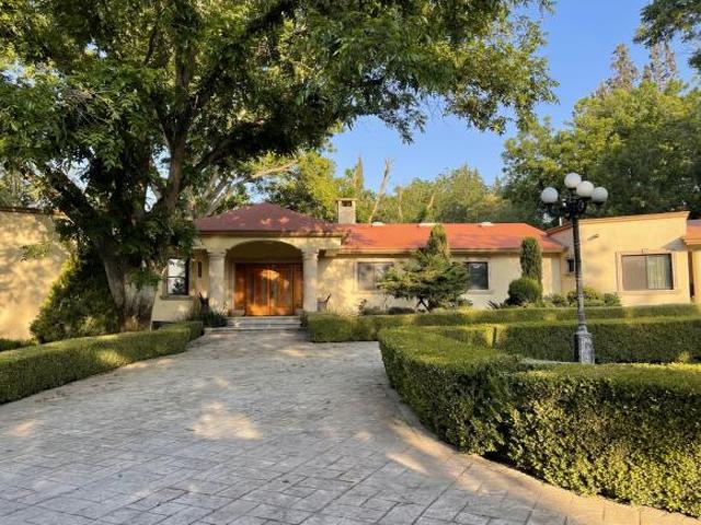 HERMOSA RESIDENCIA CON PRECIOSAS AREAS VERDES EN FRACC. EXCLUSIVO AL NORTE