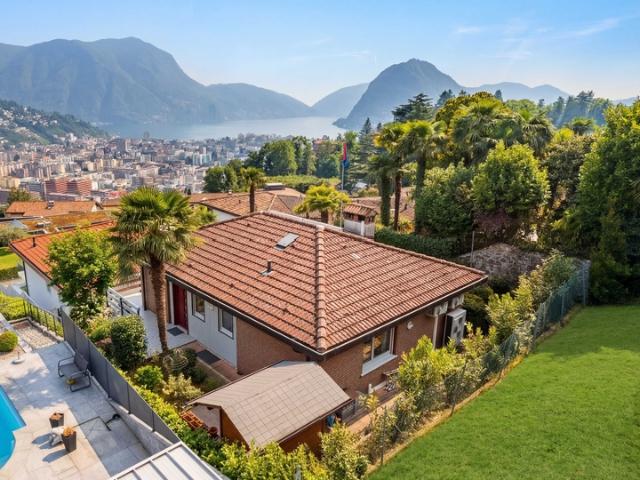 Haus kaufen in Porza, Tessin