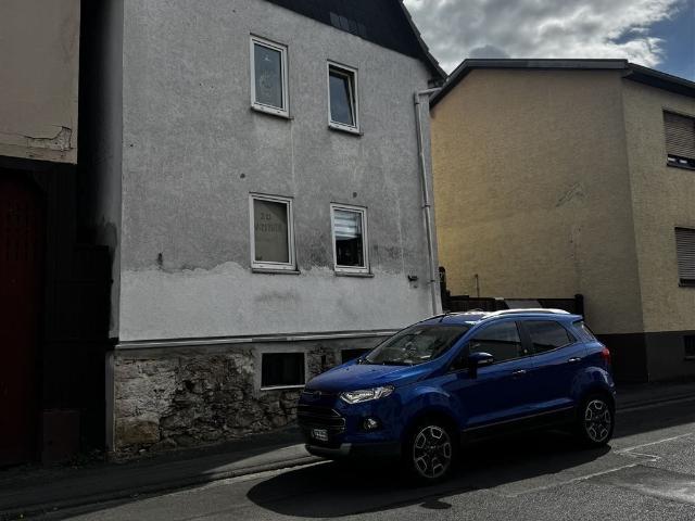 Mehrfamilienhaus kaufen in Wölfersheim