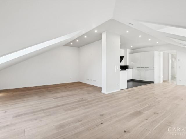 Dachgeschosswohnung kaufen in Eglfing, Haar