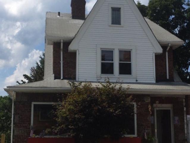 House for sale in Glenwood, New York