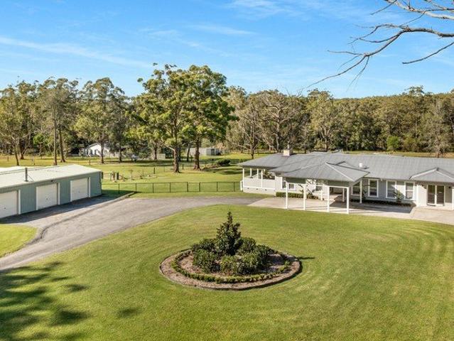 Cottage for sale in Woollamia, New South Wales