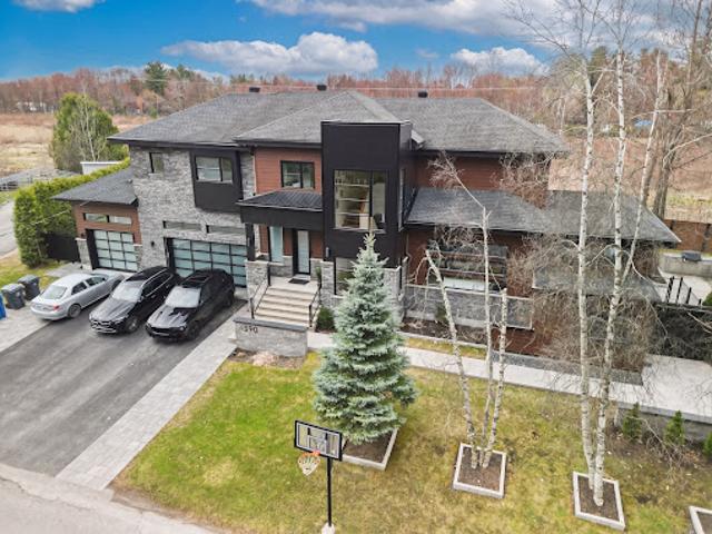 House for sale in Les Moulins, Quebec