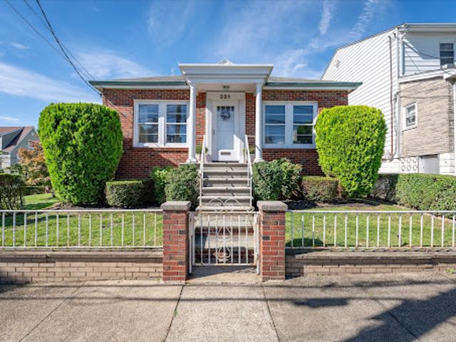 House for sale in Glenwood, New York