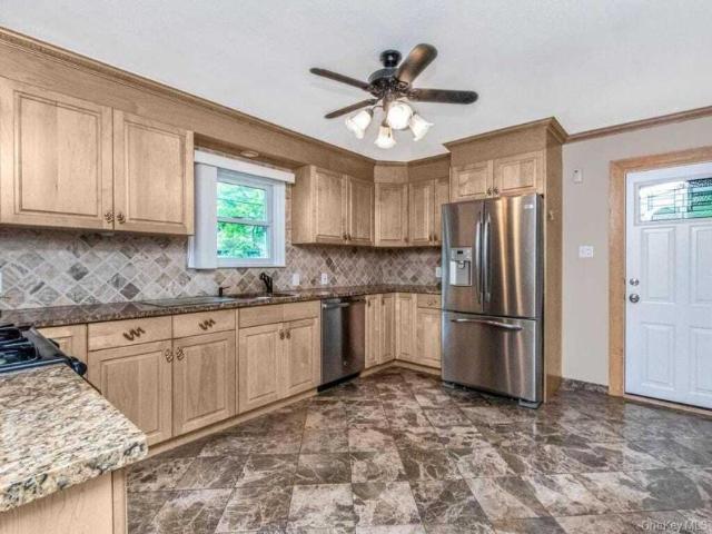 House for sale in Glenwood, New York
