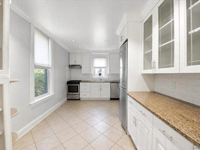 House for sale in Glenwood, New York